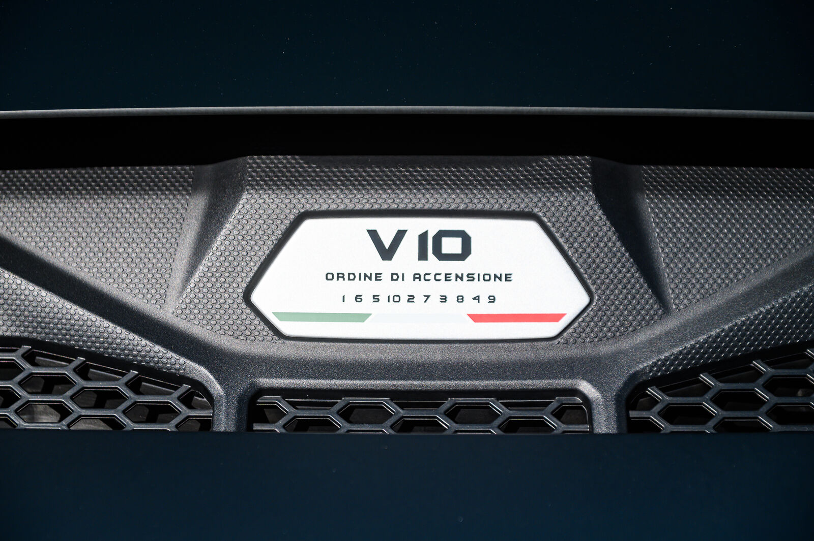 Engine cover plate showing the V10 firing order