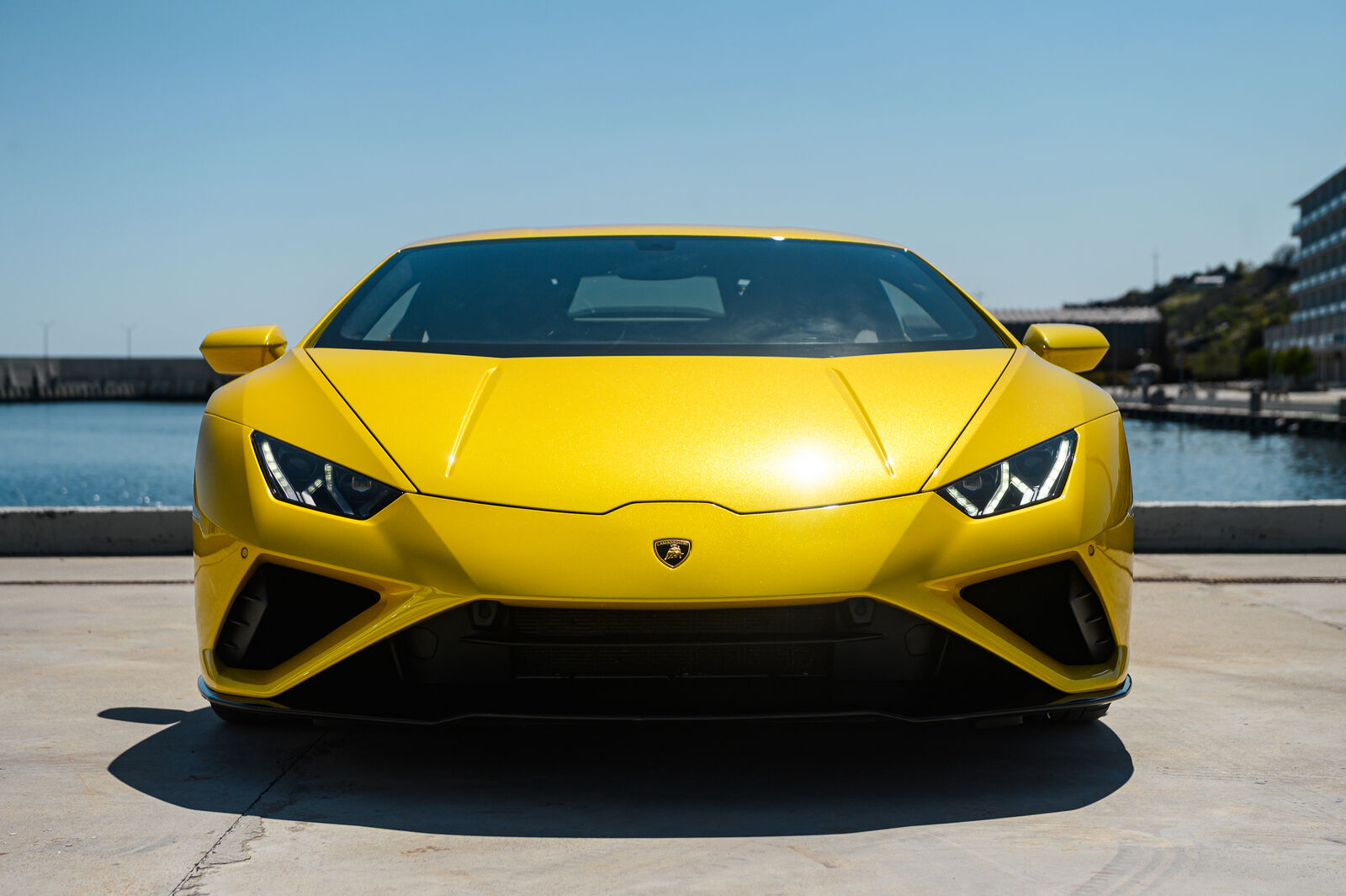 Head-on front view with headlights lit
