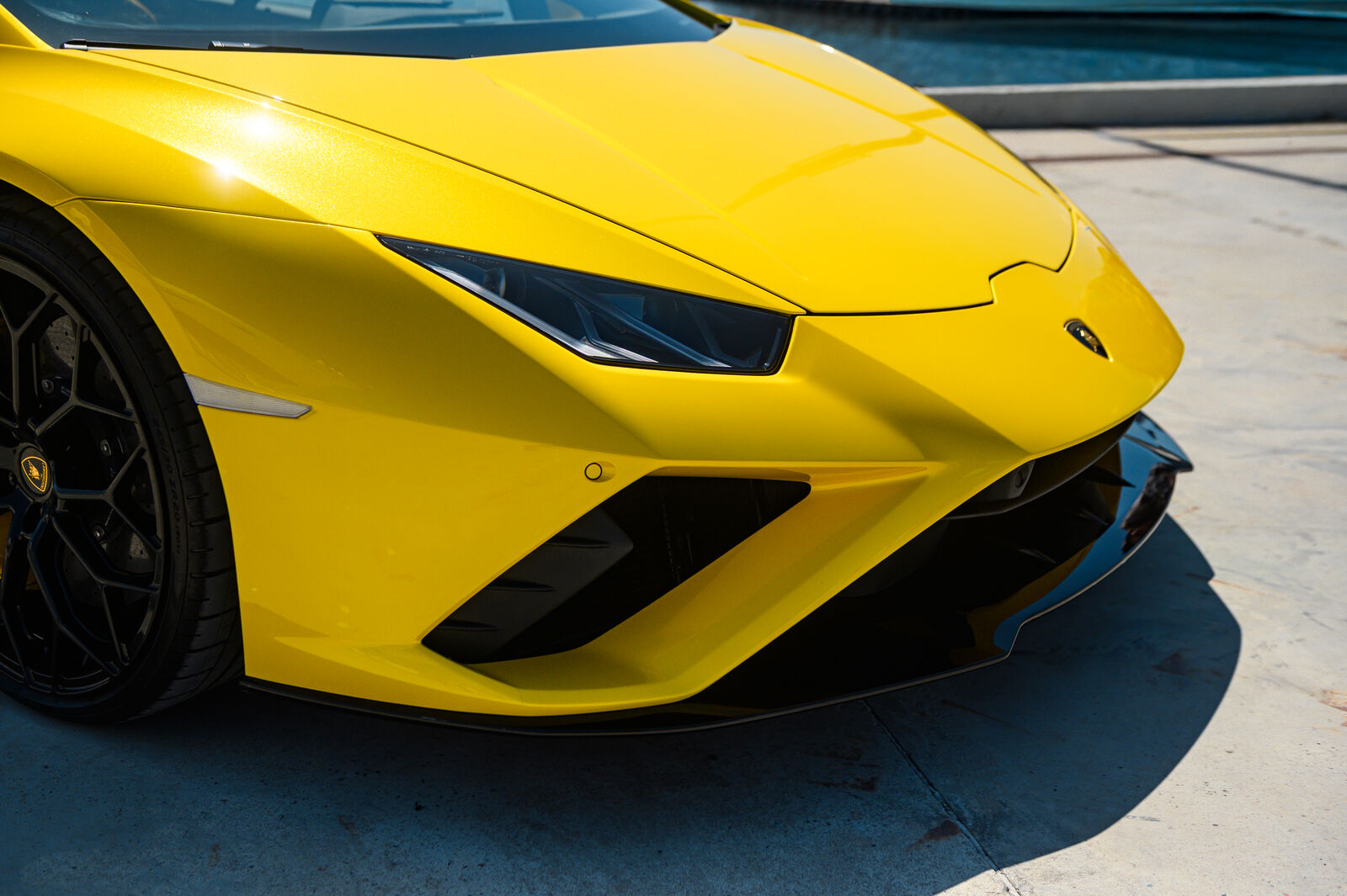 Front bumper, headlight, and air intake detail